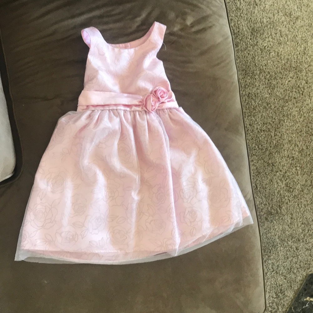 Pink dress with the flowers.